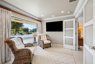 Beautifully reimagined 2-bedroom plus den residence, ideally on Quail Ridge Golf Course and Country Club in Florida - for sale on GolfHomes.com, golf home, golf lot