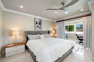 Beautifully reimagined 2-bedroom plus den residence, ideally on Quail Ridge Golf Course and Country Club in Florida - for sale on GolfHomes.com, golf home, golf lot