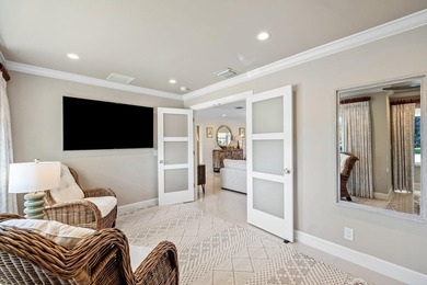 Beautifully reimagined 2-bedroom plus den residence, ideally on Quail Ridge Golf Course and Country Club in Florida - for sale on GolfHomes.com, golf home, golf lot