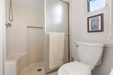 Enjoy golf course views from this well-maintained 2-bedroom on Orange Blossom Hills Golf and Country Club in Florida - for sale on GolfHomes.com, golf home, golf lot