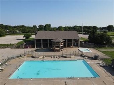 Welcome home to this picturesque setting with views for miles in on Linn Valley Lakes - Deer Trace Golf Course in Kansas - for sale on GolfHomes.com, golf home, golf lot