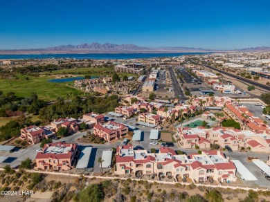 Location alert! This is your chance to own a condo in one of the on London Bridge Golf Course in Arizona - for sale on GolfHomes.com, golf home, golf lot