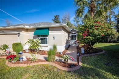 A cozy 3-bedroom home on a private conservation lot at the end on Tampa Bay Golf and Country Club in Florida - for sale on GolfHomes.com, golf home, golf lot