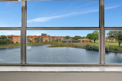 BRAND NEW A/C * BRAND NEW FLOORS * BRAND NEW CABINETS * BRAND on Sunrise Lakes Phase III in Florida - for sale on GolfHomes.com, golf home, golf lot