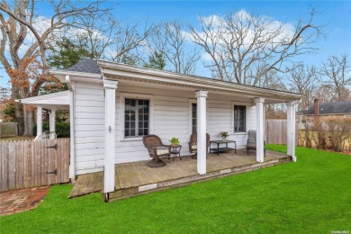 Step into this charming cottage, where the allure of a white on Bellport Country Club in New York - for sale on GolfHomes.com, golf home, golf lot
