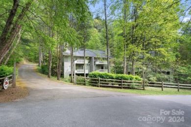Stunning contemporary townhome tucked away on a tranquil street on Country Club of Asheville in North Carolina - for sale on GolfHomes.com, golf home, golf lot