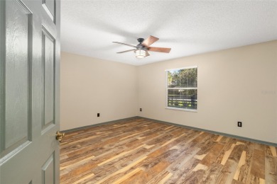 This modified Austin Model in the Village of Alhambra is priced on The Links of Spruce Creek in Florida - for sale on GolfHomes.com, golf home, golf lot