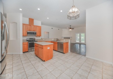 Welcome to this beautifully maintained Brick 4-bedroom on Golf Club At Fleming Island in Florida - for sale on GolfHomes.com, golf home, golf lot