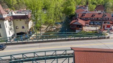 Build on this 0.28-acre lot that backs directly to the golf on Innsbruck Resort and Golf Club in Georgia - for sale on GolfHomes.com, golf home, golf lot