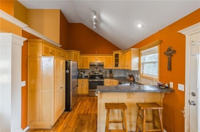 This isn't your average split-entry -- it's a showstopper. From on Paradise Pointe Golf Complex in Missouri - for sale on GolfHomes.com, golf home, golf lot