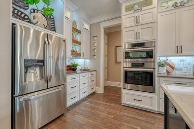 Tucked away on a quiet cul-de-sac in the highly desirable on Woodfin Ridge Golf Club in South Carolina - for sale on GolfHomes.com, golf home, golf lot