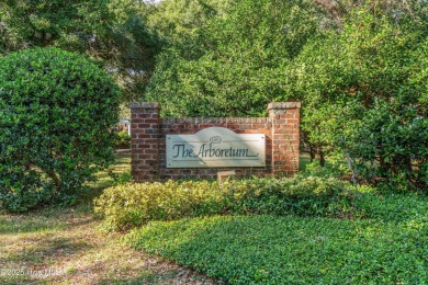 Discover the charming, well-maintained home in The Arboretum, a on Oak Island Golf Club in North Carolina - for sale on GolfHomes.com, golf home, golf lot