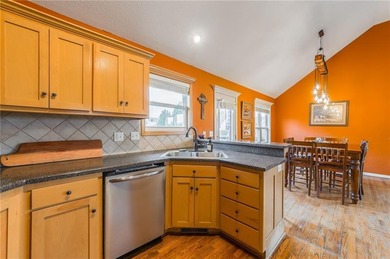 This isn't your average split-entry -- it's a showstopper. From on Paradise Pointe Golf Complex in Missouri - for sale on GolfHomes.com, golf home, golf lot