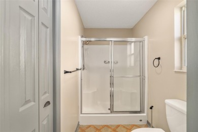 This modified Austin Model in the Village of Alhambra is priced on The Links of Spruce Creek in Florida - for sale on GolfHomes.com, golf home, golf lot