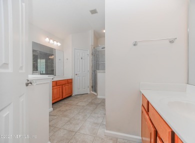 Welcome to this beautifully maintained Brick 4-bedroom on Golf Club At Fleming Island in Florida - for sale on GolfHomes.com, golf home, golf lot