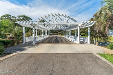 Discover the charming, well-maintained home in The Arboretum, a on Oak Island Golf Club in North Carolina - for sale on GolfHomes.com, golf home, golf lot