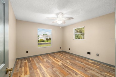 This modified Austin Model in the Village of Alhambra is priced on The Links of Spruce Creek in Florida - for sale on GolfHomes.com, golf home, golf lot