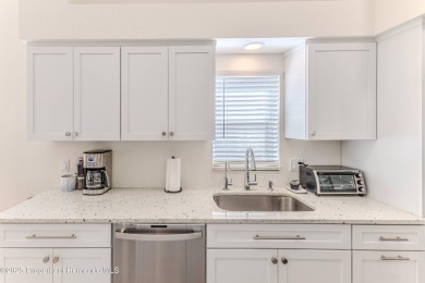 Completely remodeled 1995 Palmwood St. Thomas maintenance free on Glen Lakes Country Club in Florida - for sale on GolfHomes.com, golf home, golf lot