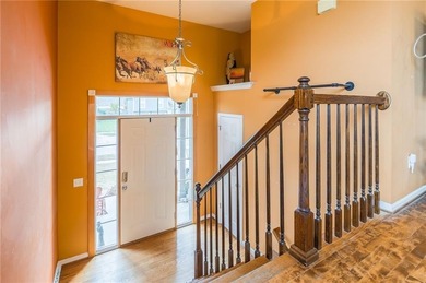 This isn't your average split-entry -- it's a showstopper. From on Paradise Pointe Golf Complex in Missouri - for sale on GolfHomes.com, golf home, golf lot