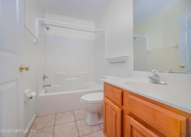 Welcome to this beautifully maintained Brick 4-bedroom on Golf Club At Fleming Island in Florida - for sale on GolfHomes.com, golf home, golf lot