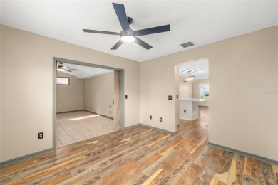 This modified Austin Model in the Village of Alhambra is priced on The Links of Spruce Creek in Florida - for sale on GolfHomes.com, golf home, golf lot