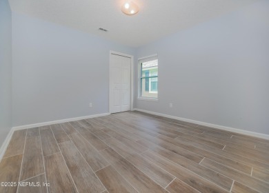 Welcome to this beautifully maintained Brick 4-bedroom on Golf Club At Fleming Island in Florida - for sale on GolfHomes.com, golf home, golf lot
