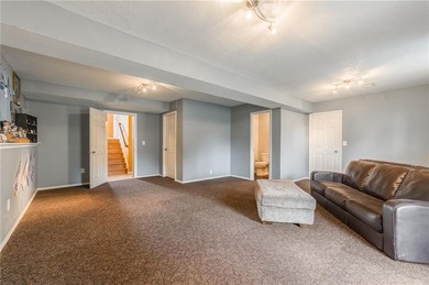 This isn't your average split-entry -- it's a showstopper. From on Paradise Pointe Golf Complex in Missouri - for sale on GolfHomes.com, golf home, golf lot