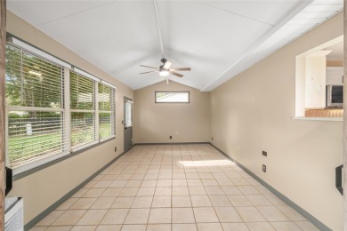 This modified Austin Model in the Village of Alhambra is priced on The Links of Spruce Creek in Florida - for sale on GolfHomes.com, golf home, golf lot