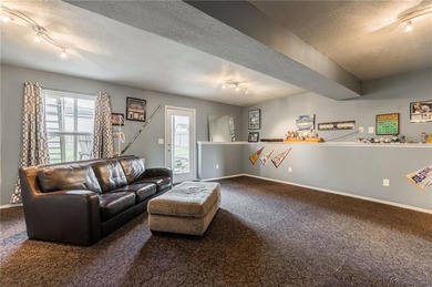 This isn't your average split-entry -- it's a showstopper. From on Paradise Pointe Golf Complex in Missouri - for sale on GolfHomes.com, golf home, golf lot