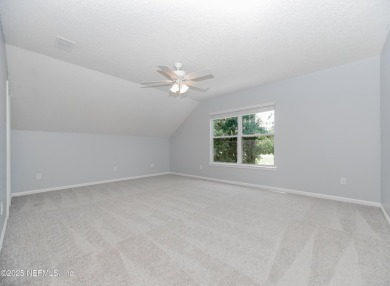 Welcome to this beautifully maintained Brick 4-bedroom on Golf Club At Fleming Island in Florida - for sale on GolfHomes.com, golf home, golf lot