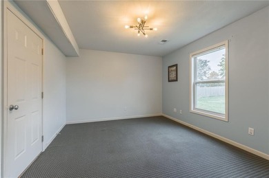 This isn't your average split-entry -- it's a showstopper. From on Paradise Pointe Golf Complex in Missouri - for sale on GolfHomes.com, golf home, golf lot