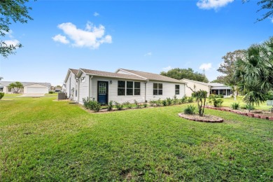 This modified Austin Model in the Village of Alhambra is priced on The Links of Spruce Creek in Florida - for sale on GolfHomes.com, golf home, golf lot