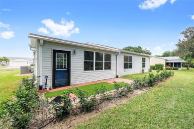 This modified Austin Model in the Village of Alhambra is priced on The Links of Spruce Creek in Florida - for sale on GolfHomes.com, golf home, golf lot