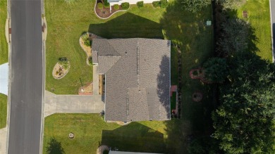 This modified Austin Model in the Village of Alhambra is priced on The Links of Spruce Creek in Florida - for sale on GolfHomes.com, golf home, golf lot