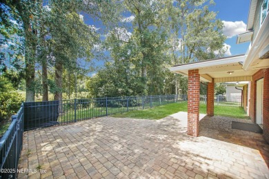 Welcome to this beautifully maintained Brick 4-bedroom on Golf Club At Fleming Island in Florida - for sale on GolfHomes.com, golf home, golf lot