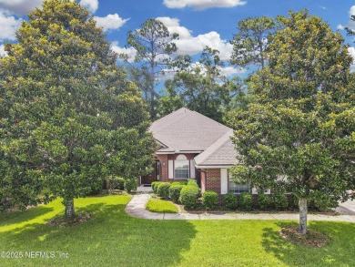 Welcome to this beautifully maintained Brick 4-bedroom on Golf Club At Fleming Island in Florida - for sale on GolfHomes.com, golf home, golf lot