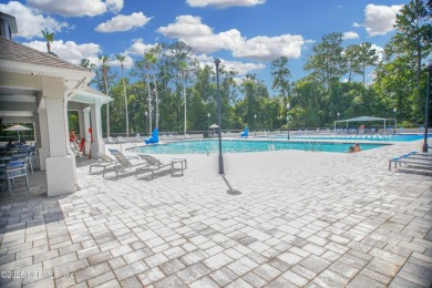 Welcome to this beautifully maintained Brick 4-bedroom on Golf Club At Fleming Island in Florida - for sale on GolfHomes.com, golf home, golf lot