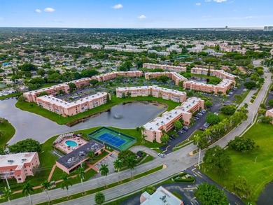 Easy to show!!! Beautiful, fully remodeled, featuring 2 spacious on Sunrise Lakes Phase III in Florida - for sale on GolfHomes.com, golf home, golf lot