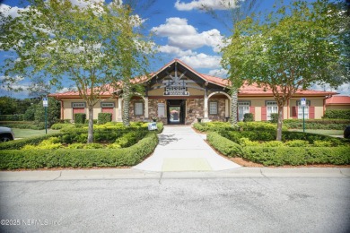 Welcome to this beautifully maintained Brick 4-bedroom on Golf Club At Fleming Island in Florida - for sale on GolfHomes.com, golf home, golf lot