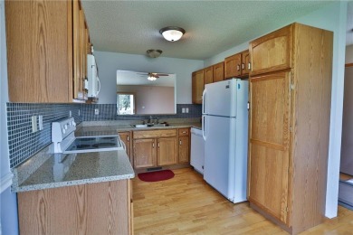 A rare find, high quality spacious, one level living, without an on New Richmond Golf Club in Wisconsin - for sale on GolfHomes.com, golf home, golf lot