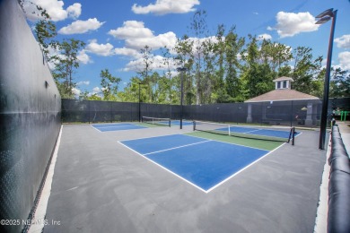Welcome to this beautifully maintained Brick 4-bedroom on Golf Club At Fleming Island in Florida - for sale on GolfHomes.com, golf home, golf lot