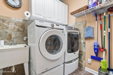 Discover the charming, well-maintained home in The Arboretum, a on Oak Island Golf Club in North Carolina - for sale on GolfHomes.com, golf home, golf lot