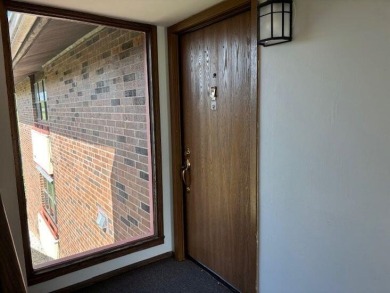 Spacious 2 bedroon, 2 bath upper level Condominium with Golf on Tuckaway Country Club in Wisconsin - for sale on GolfHomes.com, golf home, golf lot
