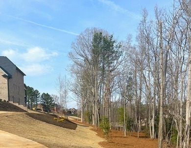 This lovingly and carefully crafted Craftsman Style Home, which on Woodfin Ridge Golf Club in South Carolina - for sale on GolfHomes.com, golf home, golf lot