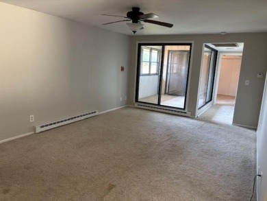 Spacious 2 bedroon, 2 bath upper level Condominium with Golf on Tuckaway Country Club in Wisconsin - for sale on GolfHomes.com, golf home, golf lot
