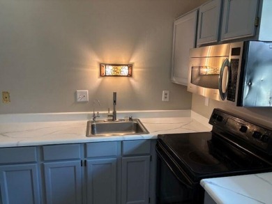 Spacious 2 bedroon, 2 bath upper level Condominium with Golf on Tuckaway Country Club in Wisconsin - for sale on GolfHomes.com, golf home, golf lot