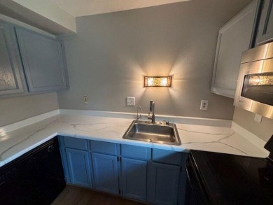 Spacious 2 bedroon, 2 bath upper level Condominium with Golf on Tuckaway Country Club in Wisconsin - for sale on GolfHomes.com, golf home, golf lot