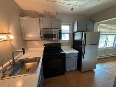 Spacious 2 bedroon, 2 bath upper level Condominium with Golf on Tuckaway Country Club in Wisconsin - for sale on GolfHomes.com, golf home, golf lot