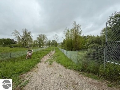 Over 11 acres of future development opportunity or recreation on Hidden Oaks Golf Course in Michigan - for sale on GolfHomes.com, golf home, golf lot