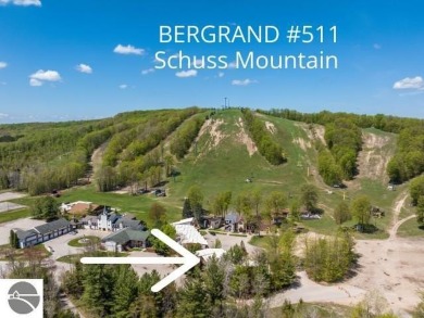 This is a sharp two-bedroom condominium located within 500 feet on Schuss Mountain Golf Club in Michigan - for sale on GolfHomes.com, golf home, golf lot